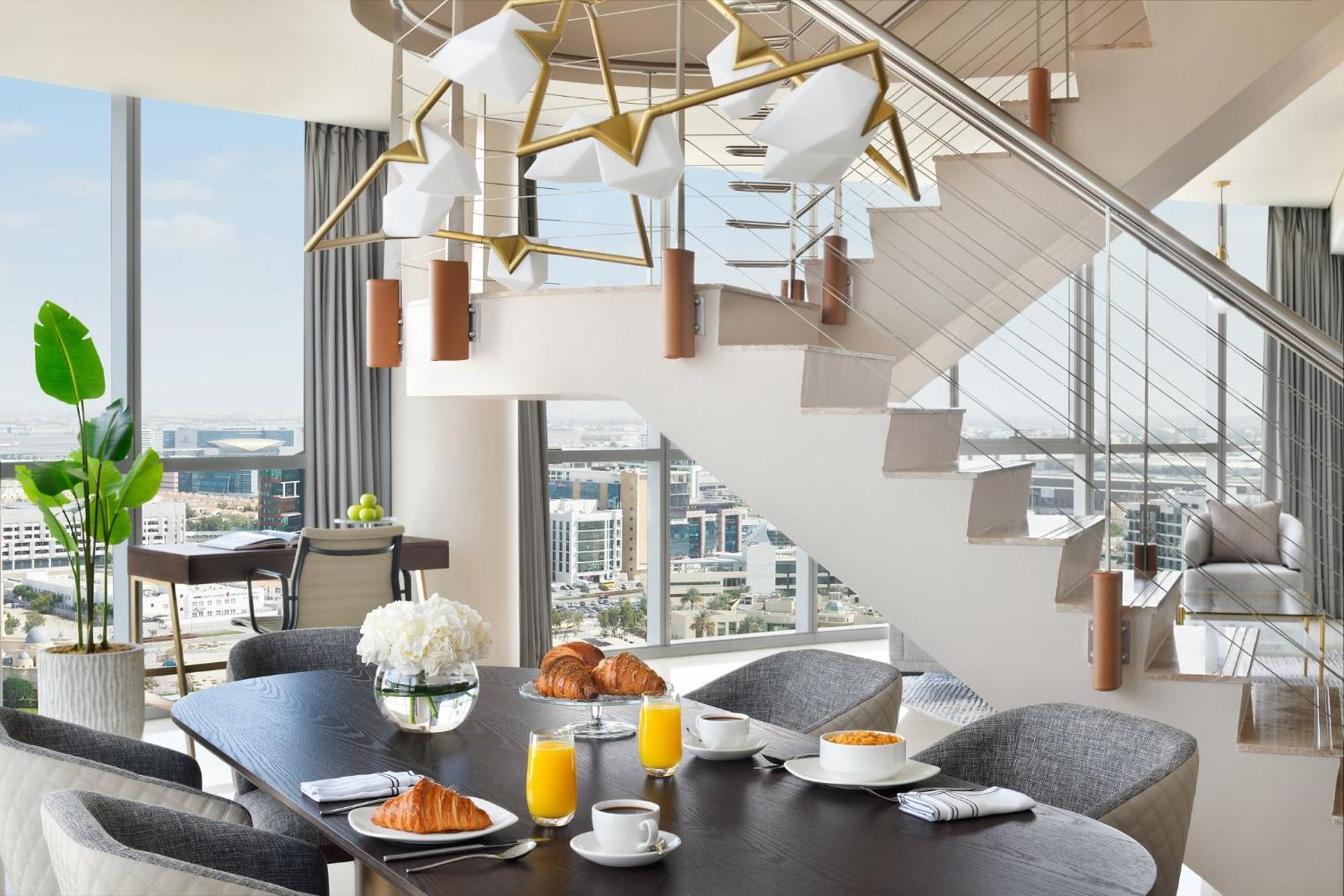 Intercontinental Residence Suites Dubai Festival City By Ihg Εξωτερικό φωτογραφία A breakfast table at the Waldorf Astoria Chengdu