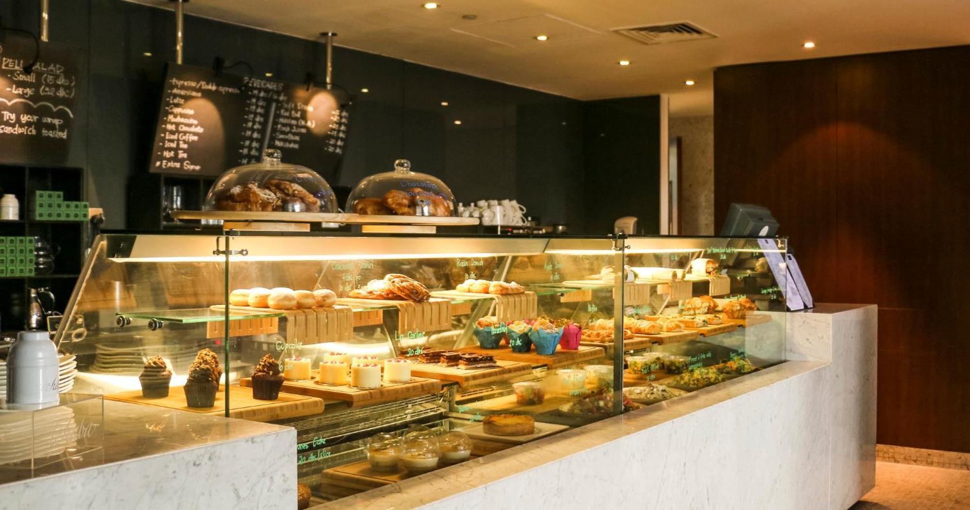 Intercontinental Residence Suites Dubai Festival City By Ihg Εξωτερικό φωτογραφία A pastry display case